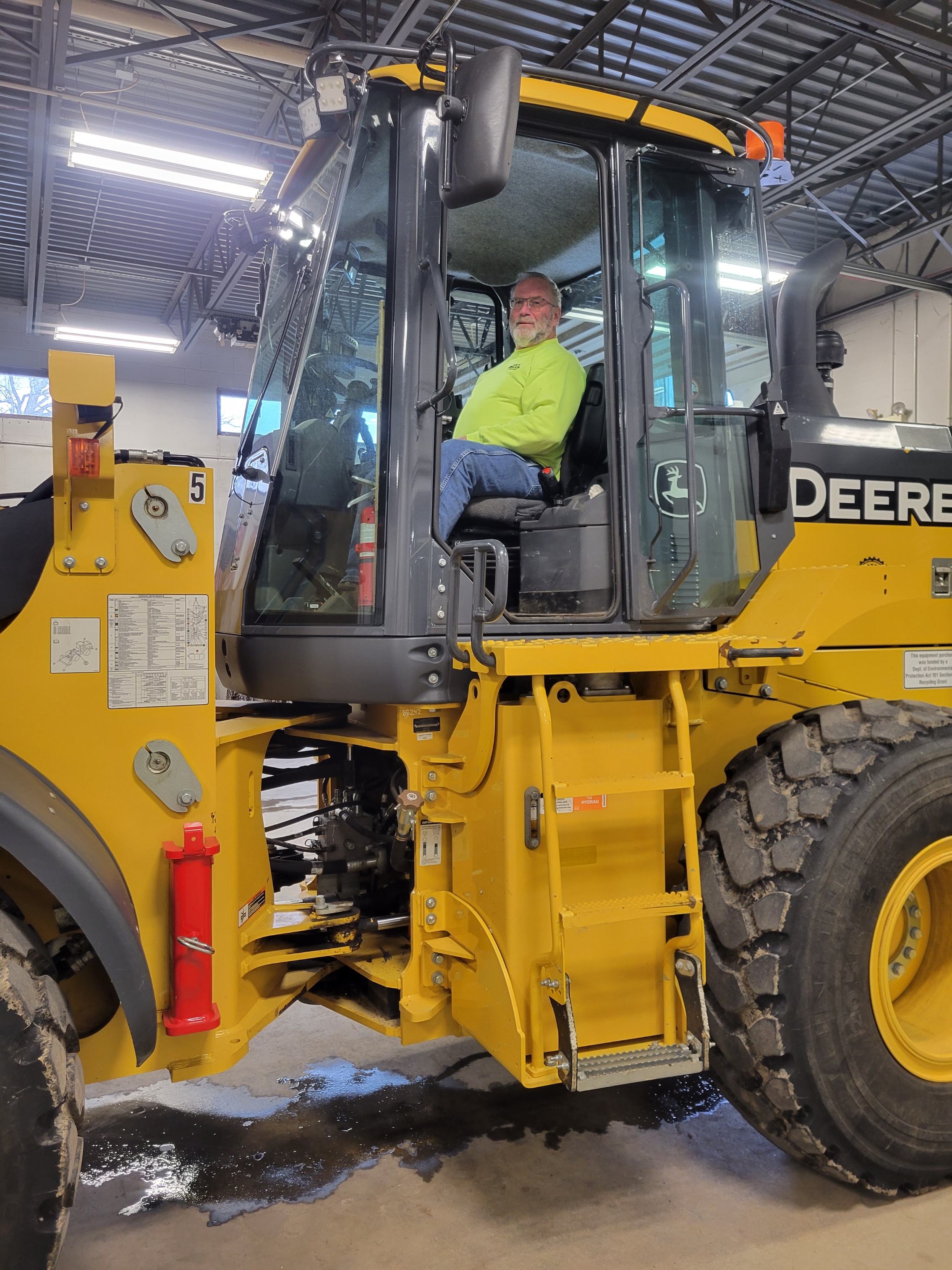 Ed Brensinger sits in a piece of heavy equipment