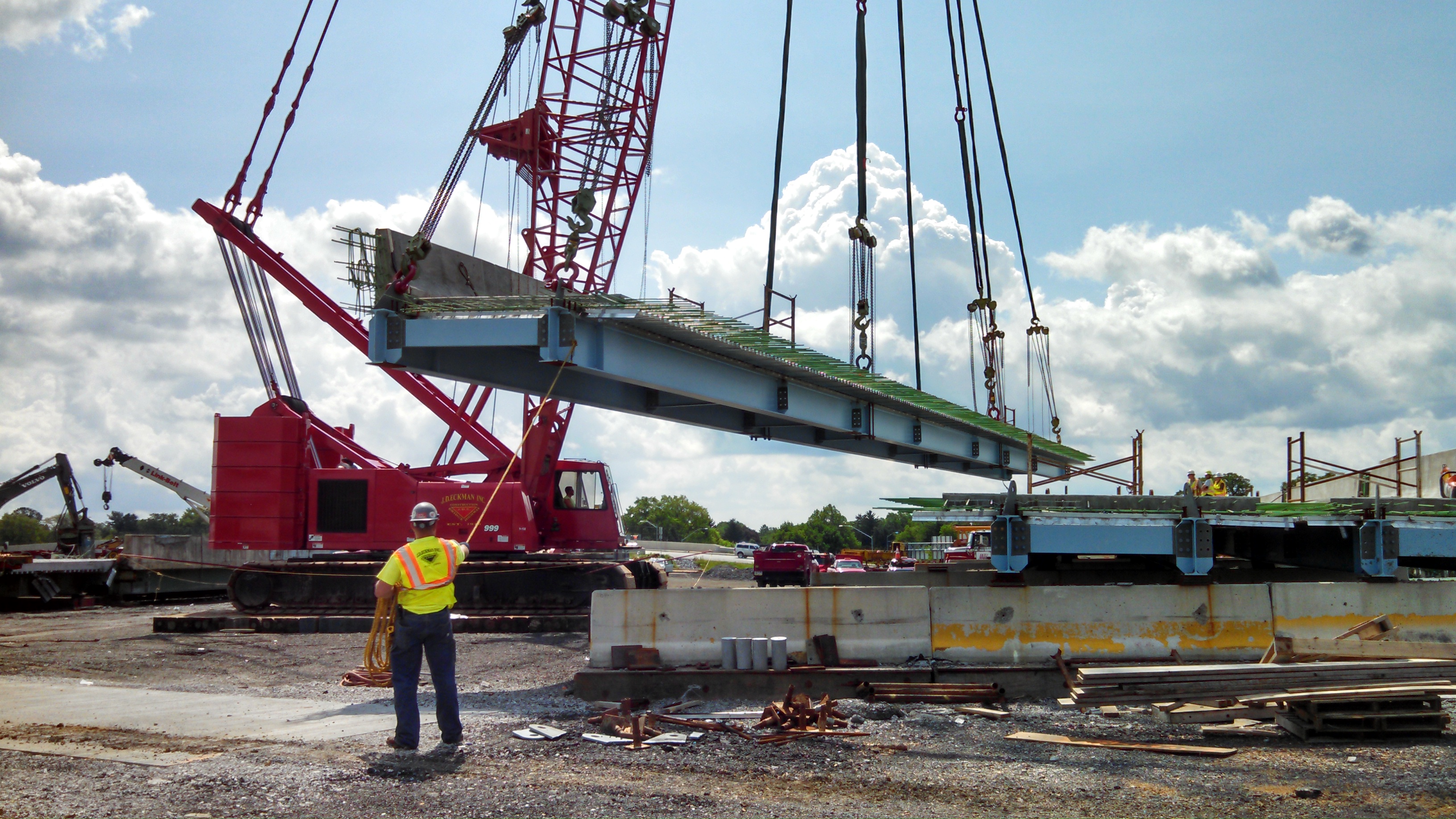 Prefabricated Bridge Element being fitted on crane